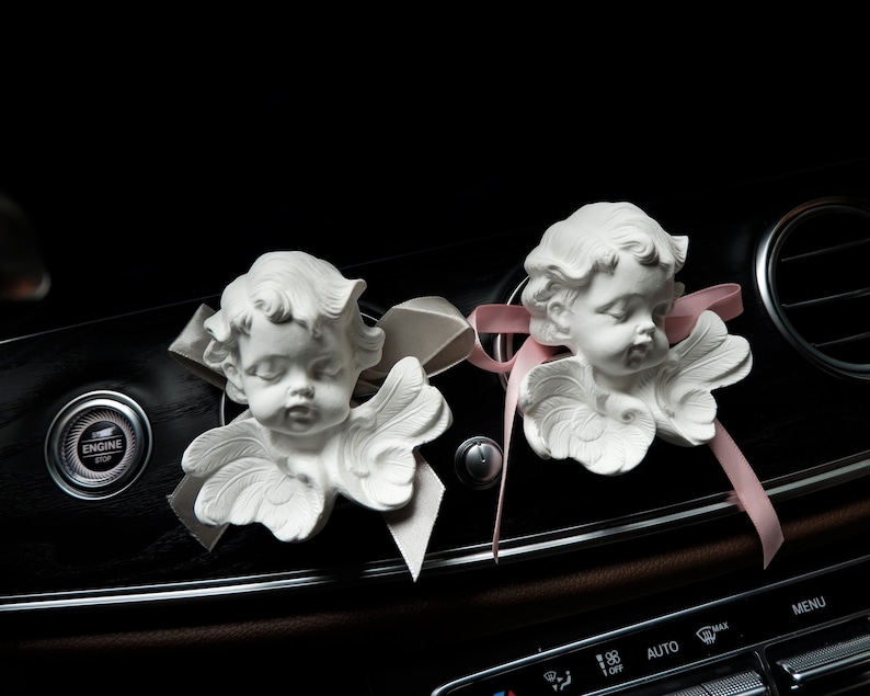 il_794xN.3234571401_4ef3.jpg Sleeping Angel Car Vent Diffuser - Image 1