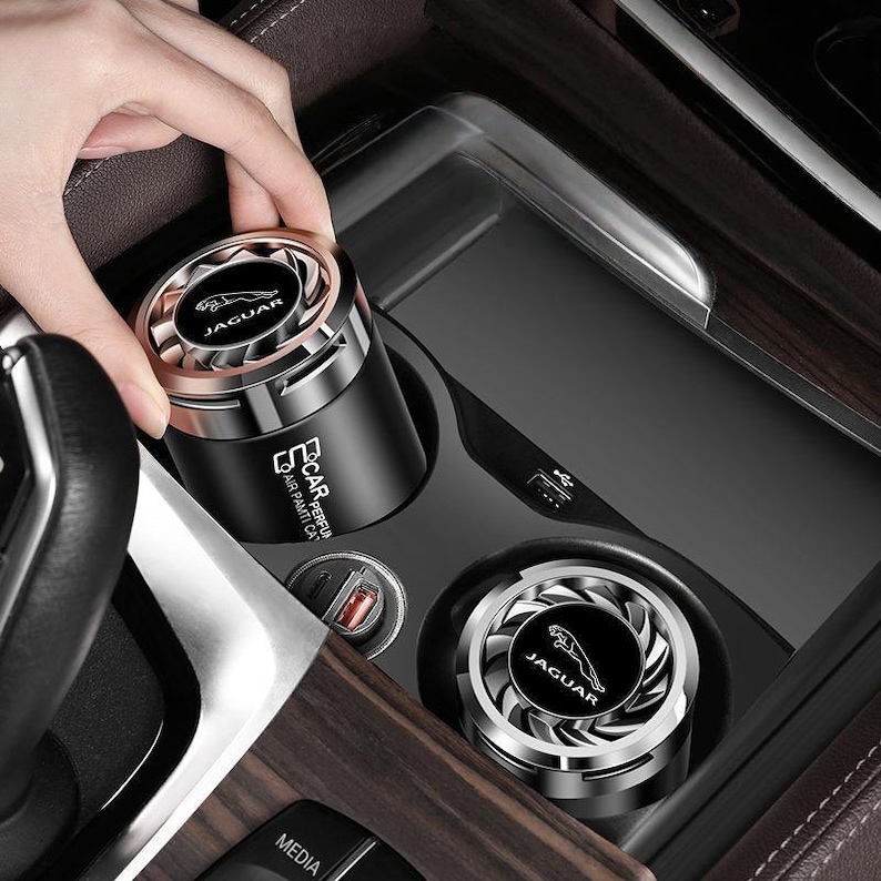 il_794xN.8313459914_2yxz.jpg Jaguar Solid Car Perfume Balm - Image 1